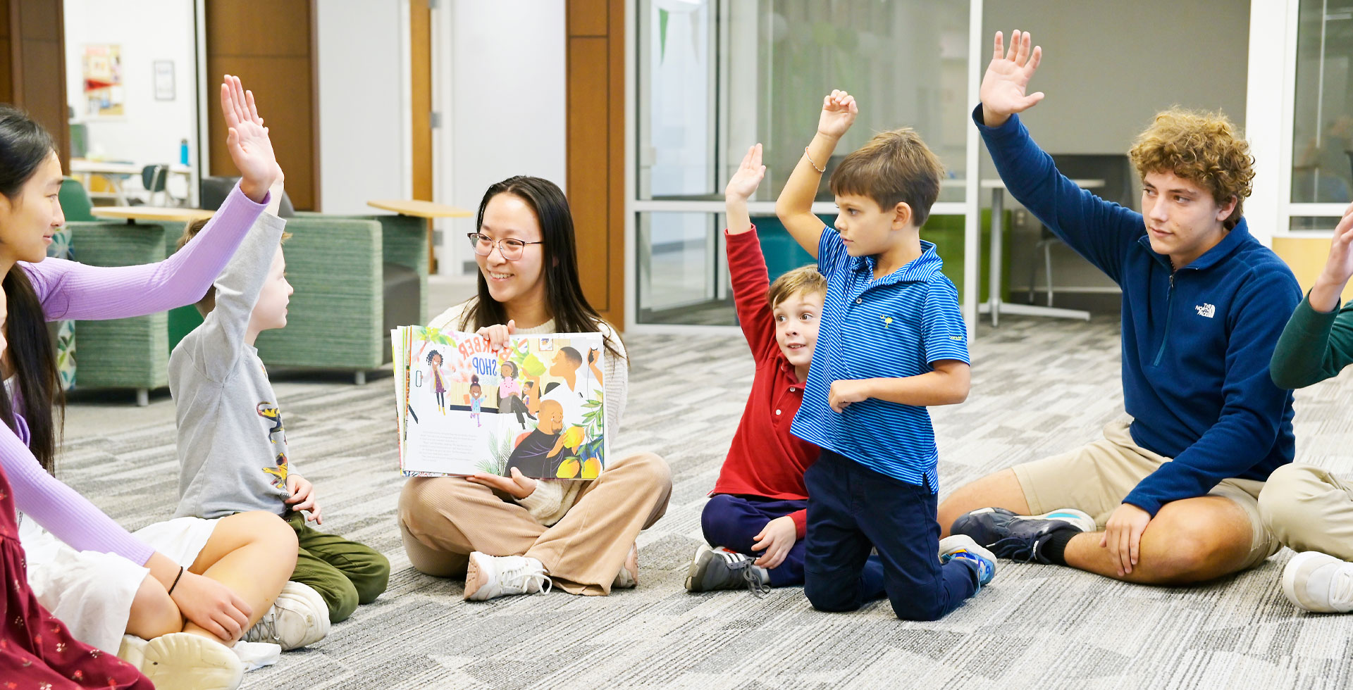 Teacher with lower school students in class at Tower Hill.