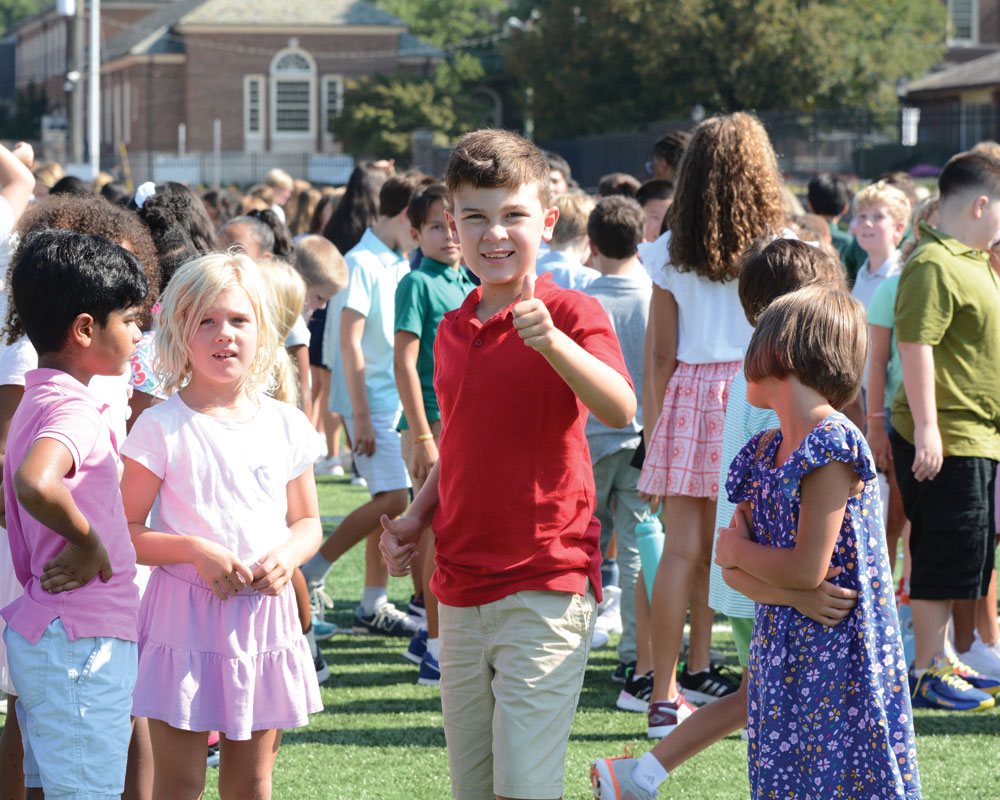 Students enjoying the outdoor facilities at the Tower Hill School campus.